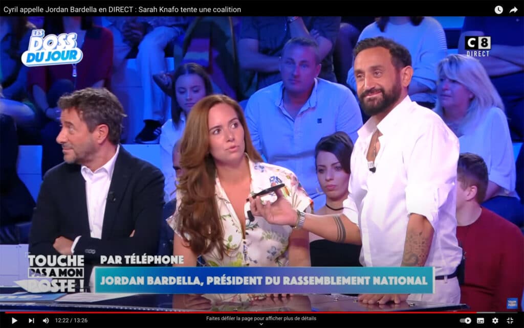 Le 13&nbsp;juin 2024, deux&nbsp;semaines avant le&nbsp;premier tour des élections législatives, sur le plateau de Touche pas à mon poste sur C8, Cyril Hanouna appelle en direct Jordan Bardella pour&nbsp;organiser un&nbsp;rapprochement avec&nbsp;Sarah Knafo (Reconquête !).Touche pas à mon poste !&nbsp;/ D.R.